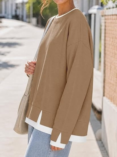Loose-fit sweatshirt for women with crew neck design and layered tailoring